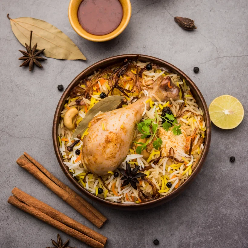 overhead-shot-of-chicken-biryani-on-grey-backgroun-2026-01-07-00-48-46-utc